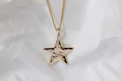 Glitter hammered 9ct yellow gold star pendant