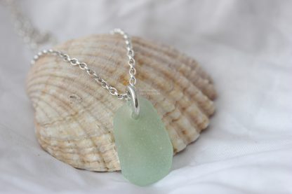 Mint green opaque seaglass pendant