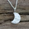 Glitter hammered waxing moon pendant
